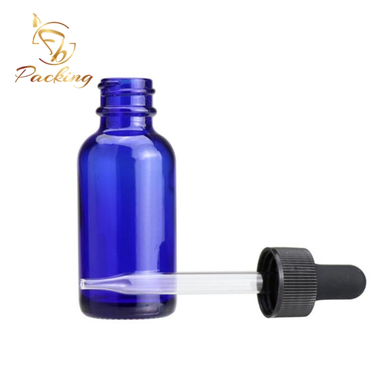 Cosmetics Boston Round Blue Glass Bottles of 30ml with Black Glass Dropper
