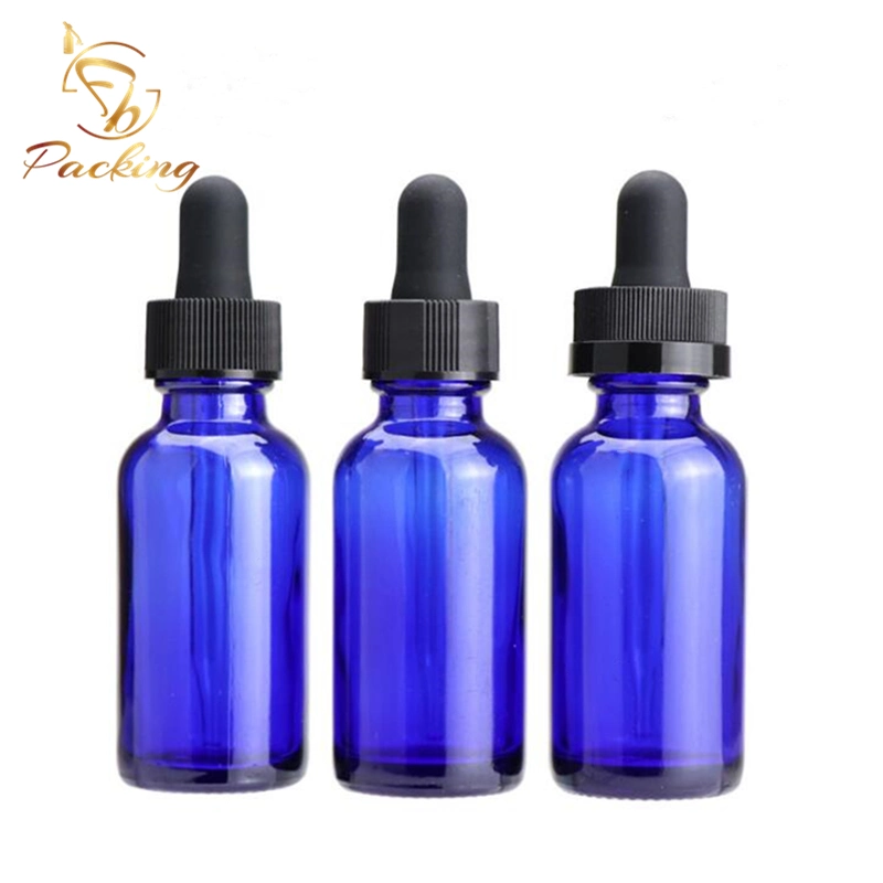 Cosmetics Boston Round Blue Glass Bottles of 30ml with Black Glass Dropper